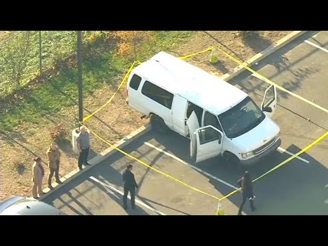 Man and woman found dead inside van in parking lot