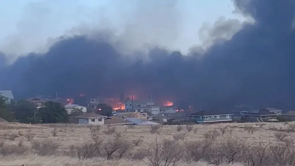 A wildfire is seen on the Hawaiian island of Maui, August 8, 2023, in this screen grab obtained from a social media video.
