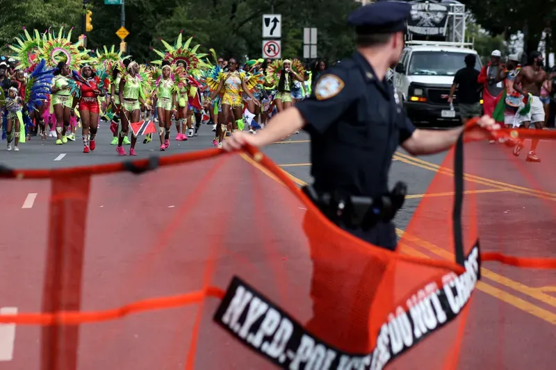 A man, 51, was tragically shot near the West Indian Day Parade route; four others shot, stabbed, or slashed