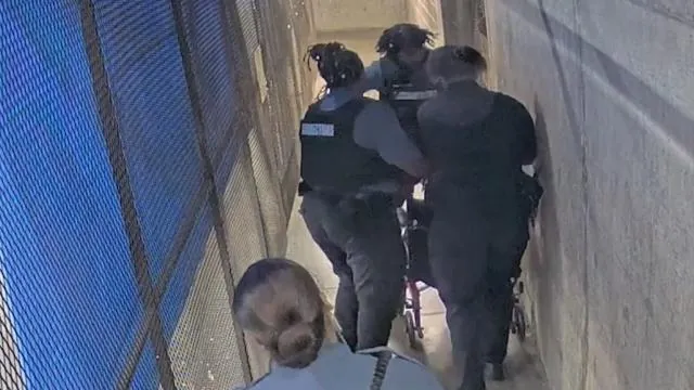 A video shows officers at the Kansas City County Jail assaulting a detainee