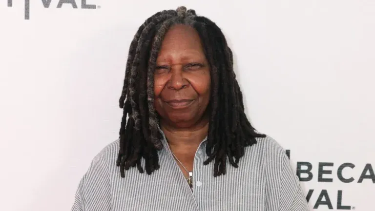 Whoopi Goldberg Returns to The View Wearing Folding Chair Necklace In Honor of Montgomery Brawl