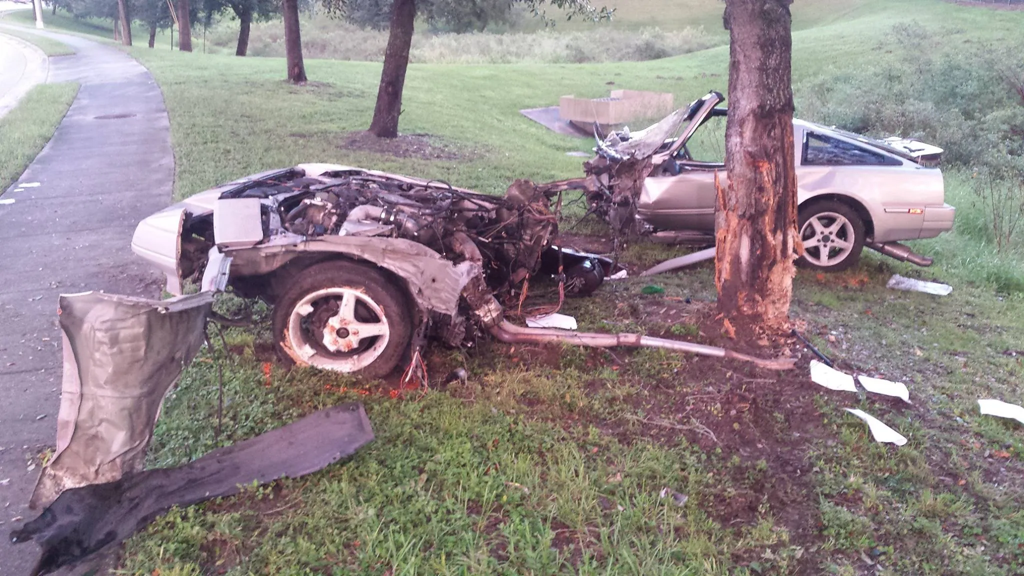 A single-car crash splits car in half, claiming 1 life
