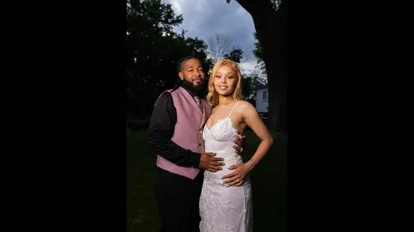 Juavvion Bagsby, 29, left, is pictured with his wife Kierra Turner, left, on their wedding day