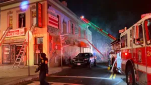 Dumpster fire spreads, catches 2-story building on fire in DC