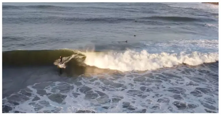 Huge Waves in Hawaii Attract Surfing Enthusiasts