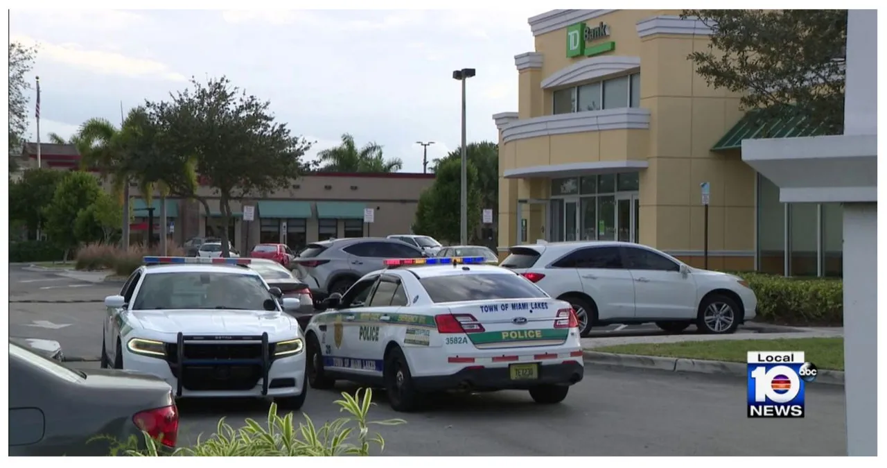 Two Men Arrested By Police Following A Strongarm Robbery Outside A Bank In Miami Lakes