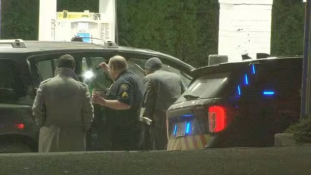 Atlanta police report finding a woman shot to death inside an SUV at a gas station near I-75